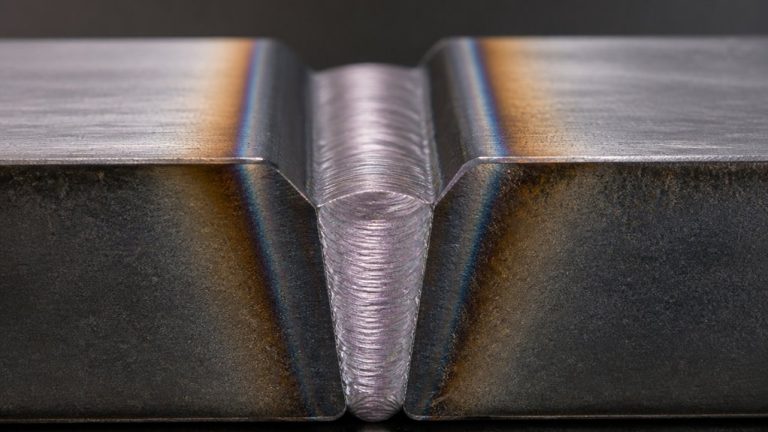 two prepared opposite groove surfaces
